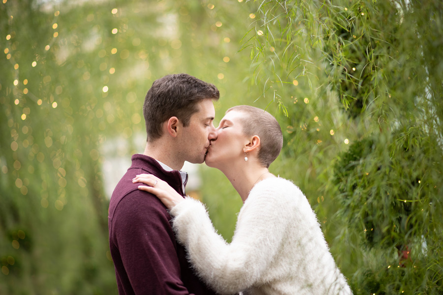 Engaged Couple Kisses in Green Hallway at Longwood Gardens