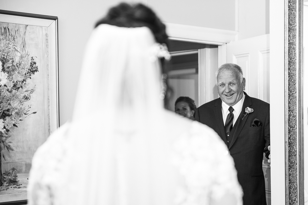 ceremony prep first look with father of the bride
